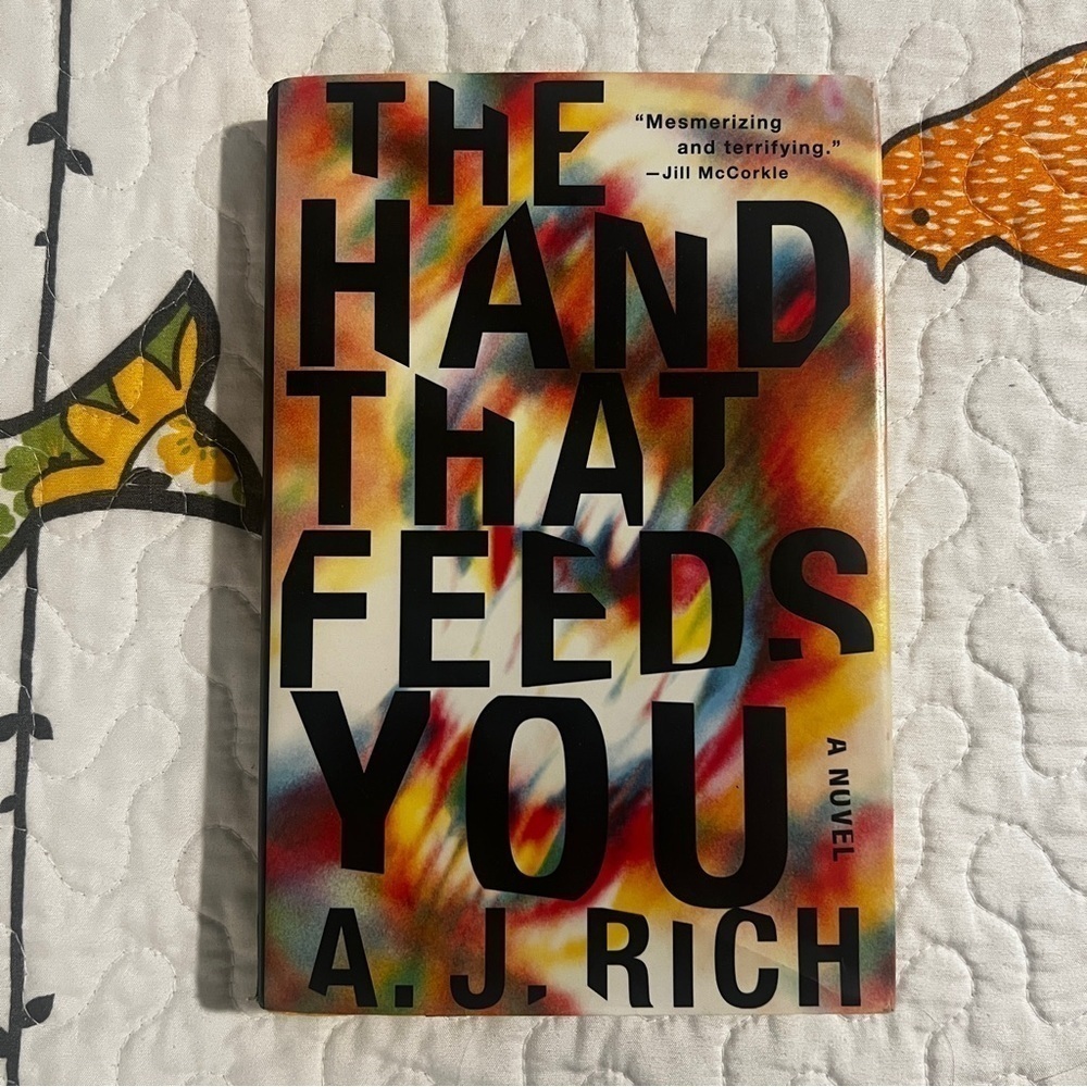 The Hand That Feeds You hardcover book by AJ Rich